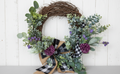 Spring wreath with purple accents